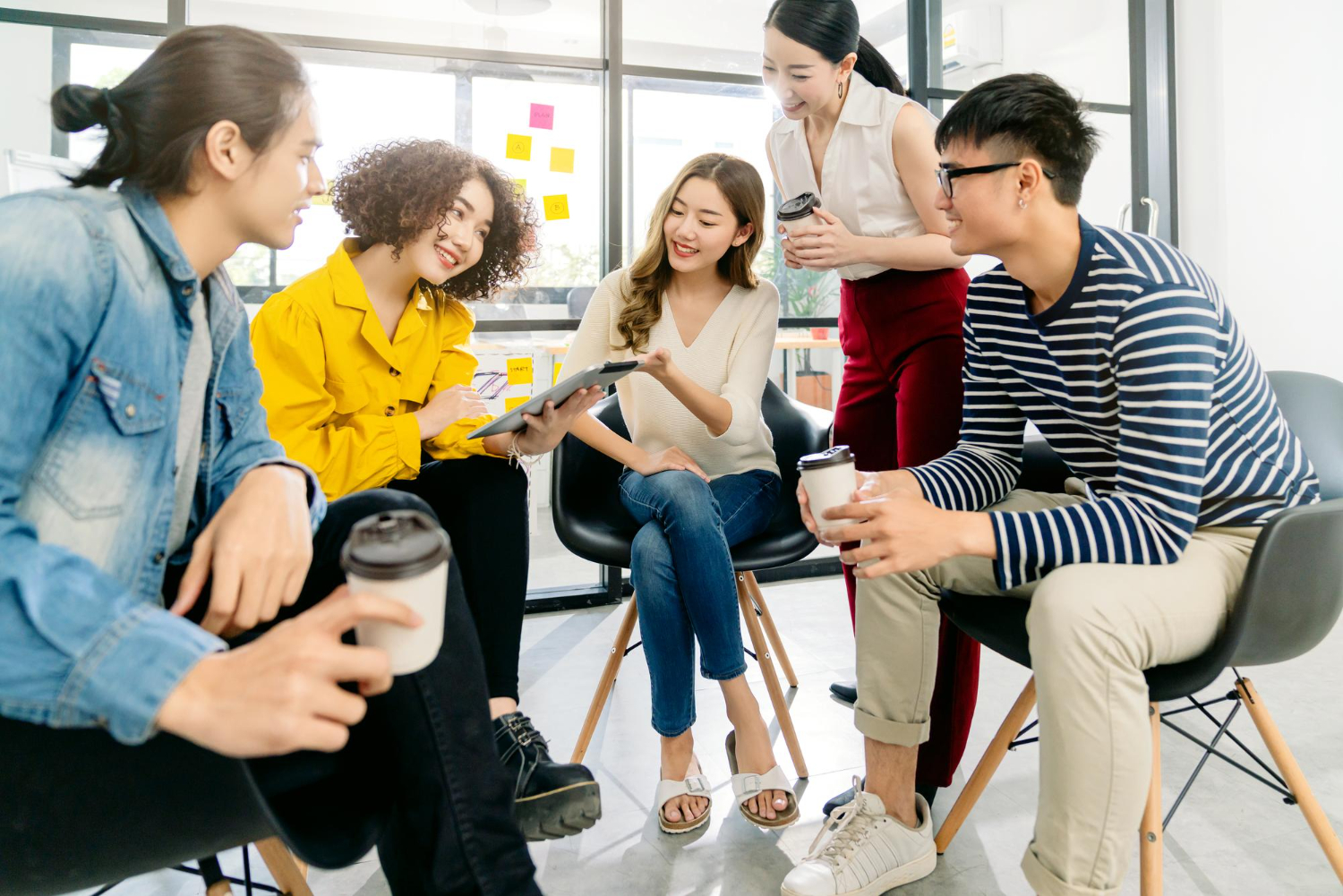 Asian teachers discussing