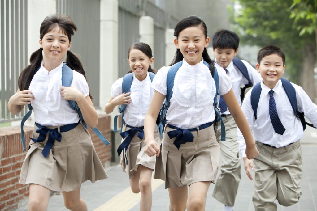 Happy students running