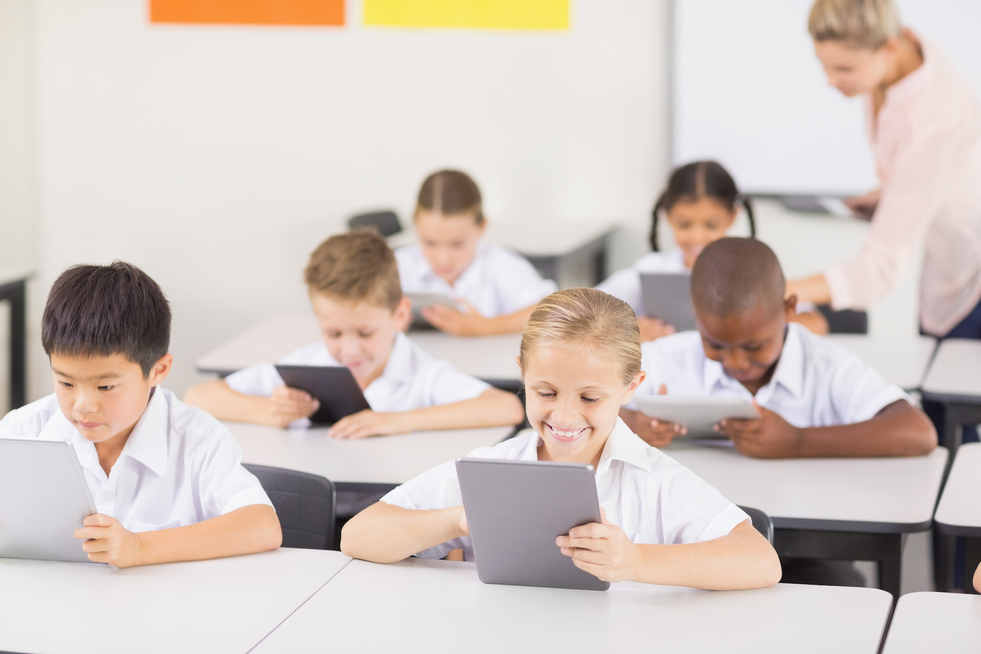 Students using tablet in classroom